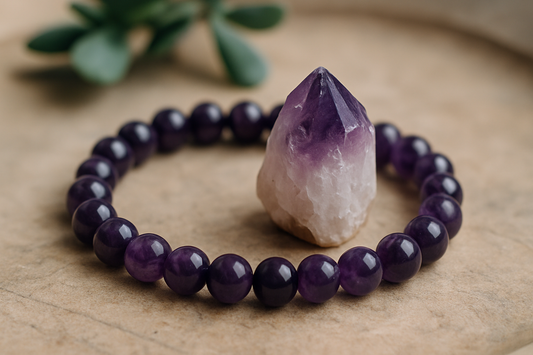 Polished amethyst beaded bracelet displayed elegantly on a soft, natural background, symbolizing calmness and spiritual healing.